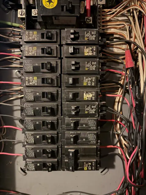Breakers in an open residential electrical panel