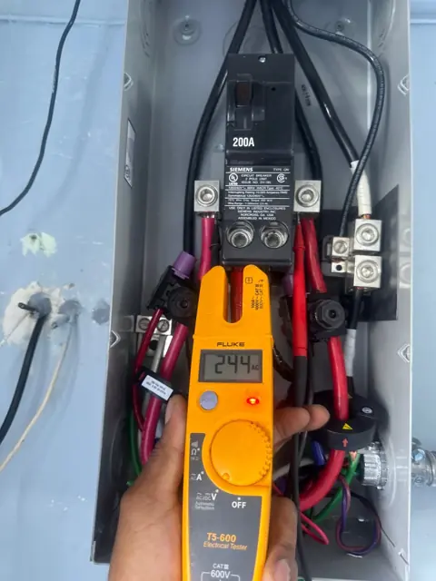 Clamp meter reading 244 volts in a disconnect