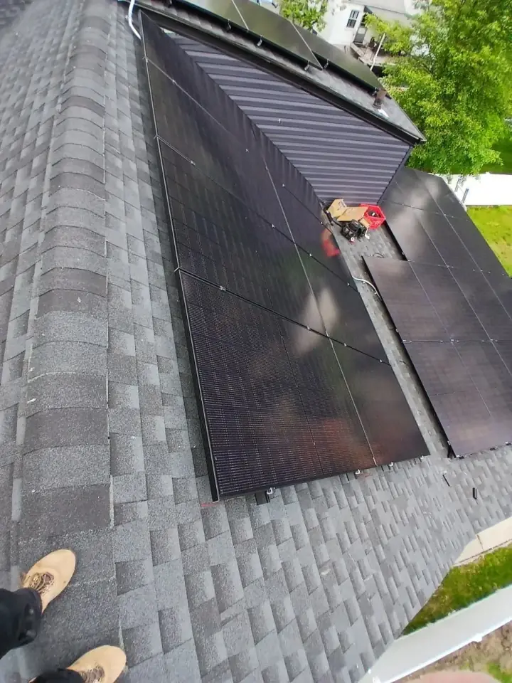 Solar panels on a shingle roof