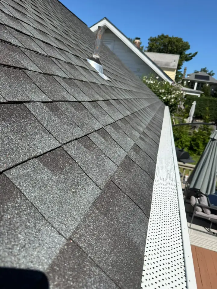 Shingles running down to a gutter